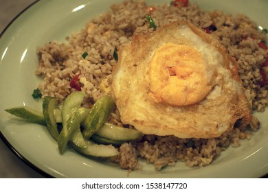 Special Kaempferia Galanga, Nasi Goreng Kencur Fried Rice Served With Eggs And Pickles