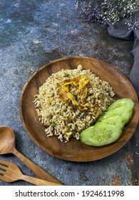 Special Kaempferia Galanga, Nasi Goreng Kencur Fried Rice Served With Eggs And Slices Of Cucumber. Famous Food In Malaysia And Indonesia. It Taste Spice And Ready To Eat. 