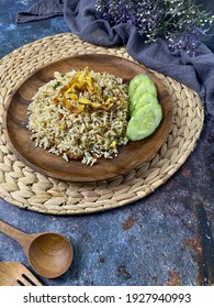 Special Kaempferia Galanga, Nasi Goreng Kencur Fried Rice Served With Eggs And Slices Of Cucumber. Famous Food In Malaysia And Indonesia. It Taste Spice And Ready To Eat. 