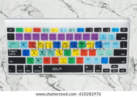 Special keyboard for Graphic Designer or Photographer, isolated with clipping path on marble background