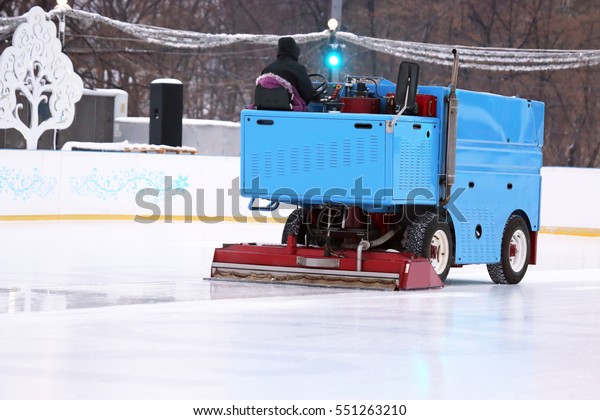 special machine\
ice harvester cleans the ice\
rink