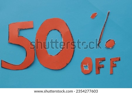 Special offer for cheaper prices. Fifty percent discounts on a blue background.