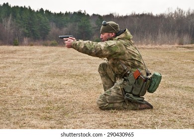 Special Operations Forces Officer Firing A Pistol