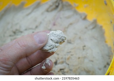 A Special Paste For Cleaning Hands From Dirt As A Result Of Working With Industrial Equipment And Printing Ink. Hand Cleaner In A Bucket. Selective Focus.