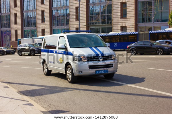 Special police\
car rides on the road in the city center\
 \
Photo taken at Theatre\
square, Lubyanka metro station, spring, may 2019, Moscow, Russia,\
car, road, buildings,\
transport
