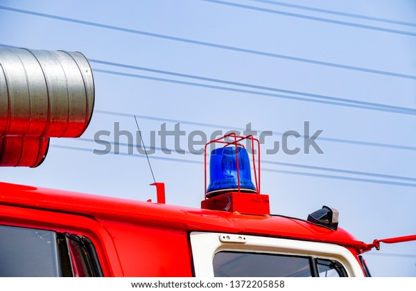 special signal flasher on the fire truck, blue\
flashing light
