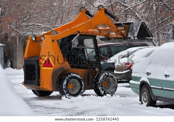 Special snow\
removal equipment left for snow removal in winter. Heavy snowfall\
in the city, people can not\
cope.