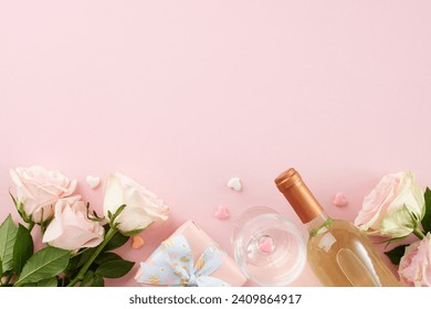 Special Valentine's Day dinner affair. Top view shot of plates, cutlery, hearts, roses, white wine, wine glass, present box on pastel pink background with advert space - Powered by Shutterstock