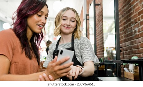 Specialist advising the customer suitable hairstyle - Powered by Shutterstock