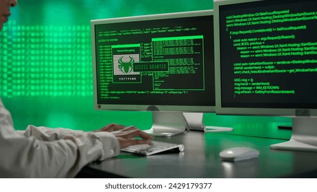 IT specialist against big digital screen. Back view african american woman programmer works on computer, screen digital code data process.