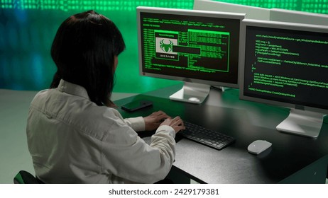 IT specialist against big digital screen. Back view african american woman programmer works on computer, screen digital code data process.