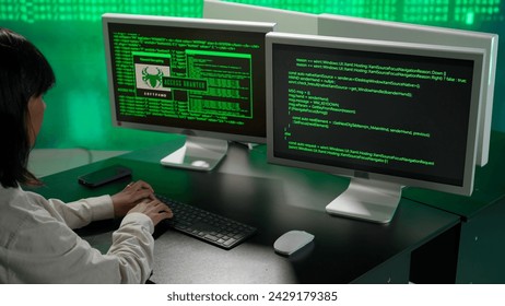 IT specialist against big digital screen. Back view african american woman programmer works on computer, screen digital code data process.
