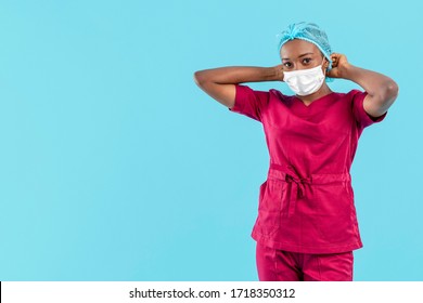 Specialist Black Female Doctor Adjusting The Medical Cap 