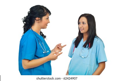 Specialist doctor give explanations,training a  young woman medical student