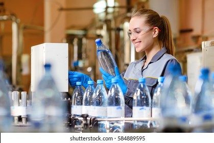 Specialist in factory checking bottles