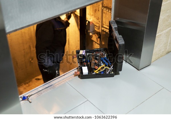 Specialist
fixing or adjusting lift mechanism in elevator schaft. Regular
repair, service and maintenance of
elevator