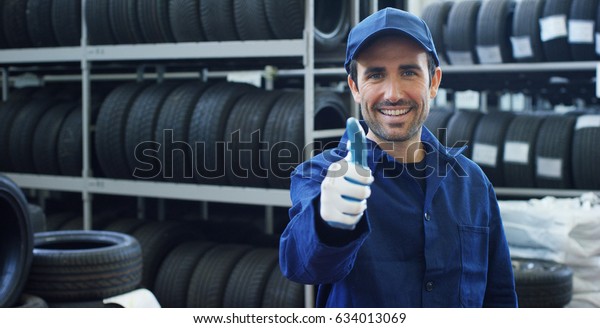 Specialist tire fitting in the car service,\
checks the tire and rubber tread for safety. Concept: repair of\
machines, fault diagnosis, repair specialist, technical maintenance\
and on-board\
computer.\
