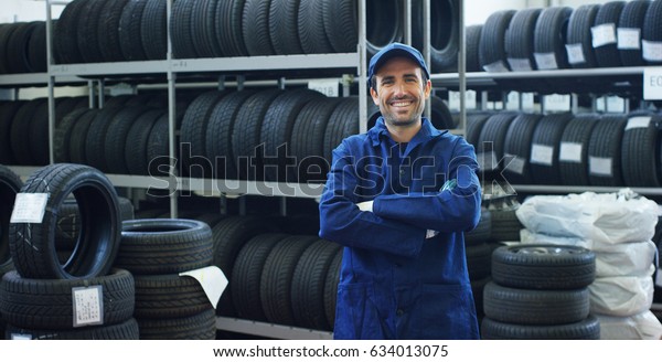 Specialist tire fitting in the car service,
checks the tire and rubber tread for safety. Concept: repair of
machines, fault diagnosis, repair specialist, technical maintenance
and on-board
computer.
