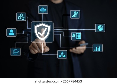 An IT specialist using a smartphone configures cloud-based security solutions for compliance with global data protection standards. Security for Business data and Protection. - Powered by Shutterstock - Get 15% off with code: PIKWIZARD15