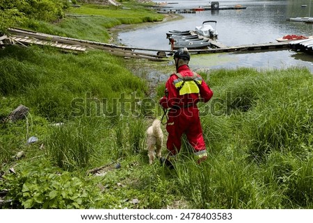 specialized cadaver dog working with its handler 