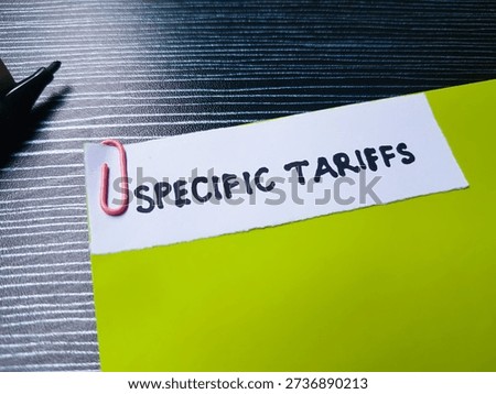 Specific tariffs writting on table background. 