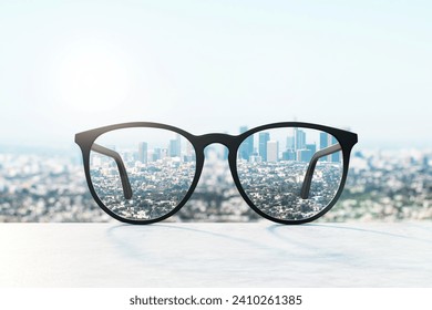 Spectacles with a clear view of the city, metaphor for focused vision and modern urban life - Powered by Shutterstock