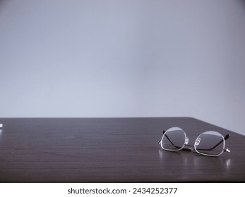 Spectacles on a coffee table