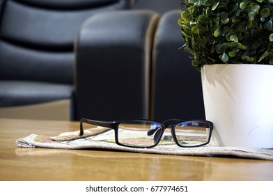 Spectacles on a table