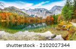 Spectacular autumn scene of Hinterer Langbathsee lake. Poppular travell destination. Location: Vorderer Langbathsee, Salzkammergut region, Upper Austria, Austria, Europe.