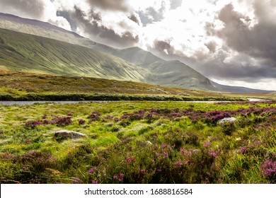 Spectacular Bright Landscape Of The Incredible Mountains And A River Of The Scottish Highlands In The Summer.