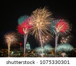 Spectacular fireworks over the Wisconsin State Capitol from across Lake Monona