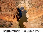 Spectacular Glen Helen Gorge at the western end of the West MacDonnell Ranges in Central Australia, seen from the air.  The permanent waterhole here is fed by the Finke River. 