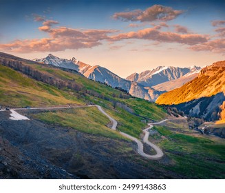 Spectacular morning view of Col d'Isoard rocky mountain pass popular with cyclists and frequently featured in the Tour de France. Colorful spring sunrise in Arvieux Alps. Traveling concept background. - Powered by Shutterstock