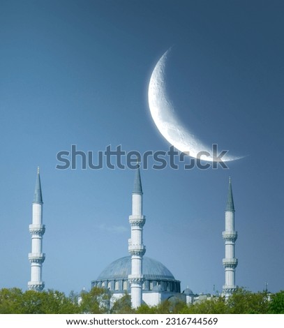 Spectacular mosque view with crescent in the sky. Greeting card background photo for holy holidays. Eid Mubarak. Islam and religion concept background photo.