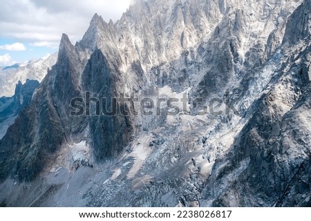 Spectacular mountain crags between glaciers in the alps.