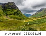Spectacular mountain scenery with a stormy, grey sky in Glencoe, Scotland