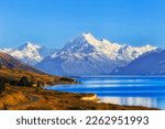 Spectacular Mt Cook snow capped rocky peak over Lake Pukaki of Tasman valley in New Zealand.