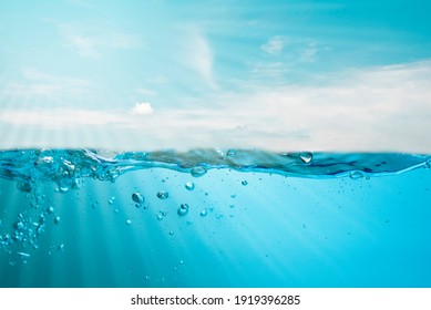 Spectacular ocean waves stop steaming with separate bubbles on a bright sky background. Popular corners, natural concepts - Shutterstock ID 1919396285