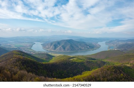 Spectacular panoramic view of danube bend from Prédikálószék lookout point. This region of Hungary is touristically very significant. Dömös and Visegrád at the background. Spring landscape.