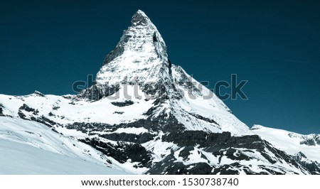 Similar – Matterhorn in clouds