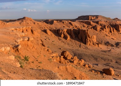 Spectacular scenic sunrise view of the red rocks of the Mongolian Flaming Cliffs in the Gobi Desert of remote Mongolia