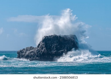 Spectacular splashes explode as wind driven waves strike rock 2 in Piedras Blancas State Marine Reserve