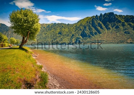 Spectacular summer view of Idro lake. Colorful morning scene of Anfo comune in the province of Brescia in northern Italy, Europe. Beauty of nature concept background.
