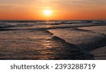 Spectacular sunset on the beach with a stormy sky. Peace, calm, walks. Costa de la Luz, Huelva, Spain