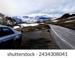 Spectacular view at Beartooth Highway Summit, Wyoming. A Drive of incredible beauty. Yellowstone. Rocky mountains covered by snow. Northwest. Majestic beartooth mountains, alpine landscape. Road trip.