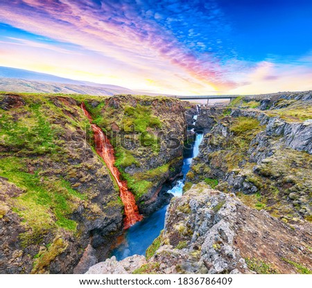 Spectacular view of  Kolugljufur canyon and Kolufossar falls. Kolugljufur gorge is located on river Vididalsa.  Location: Kolufossar waterfall, Vestur-Hunavatnssysla, Iceland, Europe