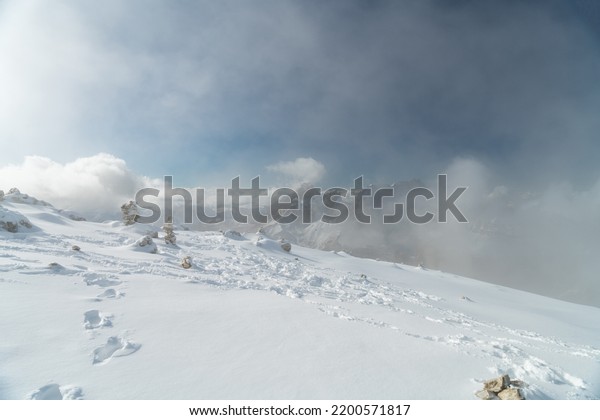 Spectacular view of Sella mountain Group with Sas\
Pordoi summit (and the cable car station on the top) as seen from\
Passo Pordoi, Dolomites, Trentino, Alto-Adige, Bolzano, Trento,\
South Tyrol, Italy