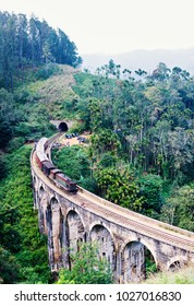 Spectacular view of a train crossing over Nine Arches bridge in Demodara one of the iconic landmarks in Sri Lanka
