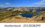 spectacular views of twin lakes and mountain  peaks on a  sunny summer day along the beartooth highway, a national scenic byway, wyoming