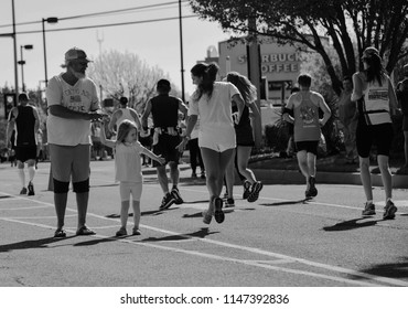 Spectators Cheer On Runners At The Oklahoma City OK USA Marathon. 6-9-2018